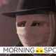 An image of Darkman, wearing a fedora over his heavily bandaged face.